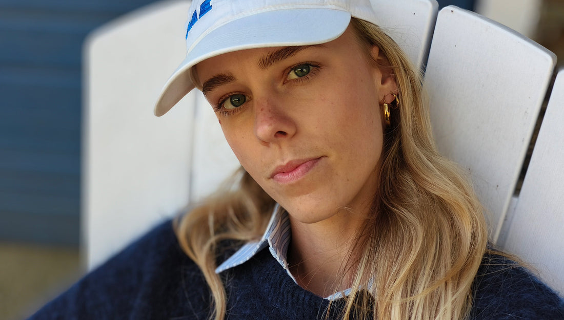 a woman wearing a white hat