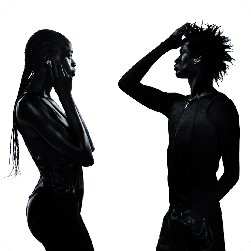 a silhouette of a woman and a man