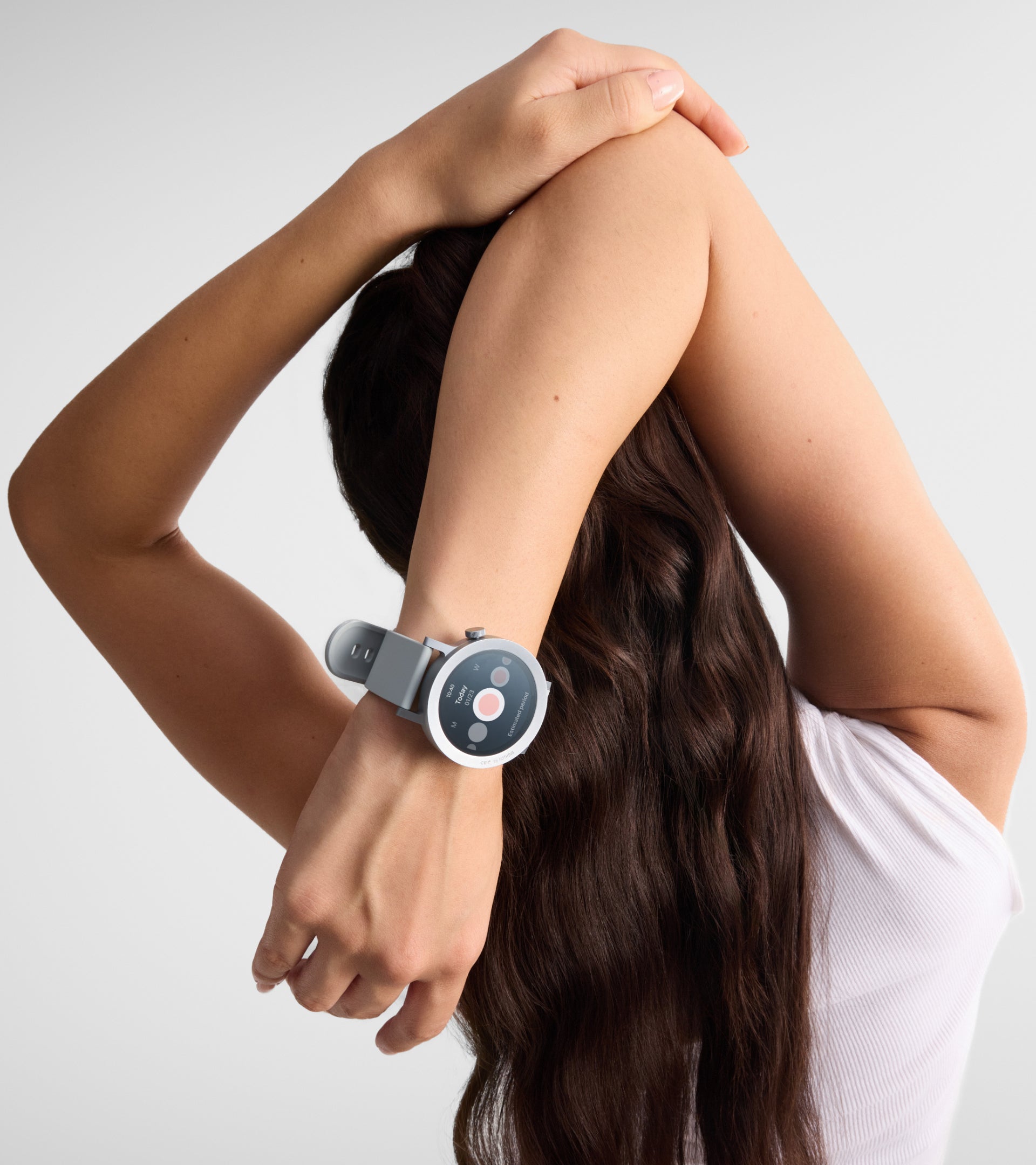 a woman with her arm around her head